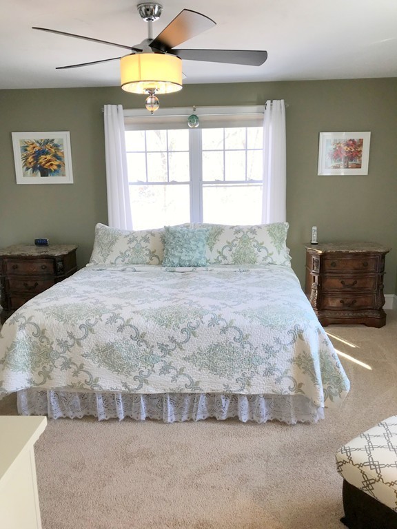 343 Quarry Street, Unit 2 Quincy, MA 02169 - Photo 18 of 30 a bedroom with a bed and a window