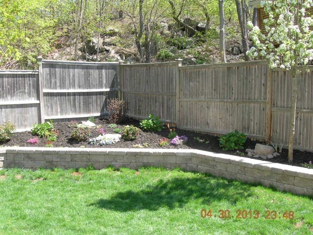 343 Quarry Street, Unit 2 Quincy, MA 02169 - Photo 29 of 30 a garden covered with wooden fence