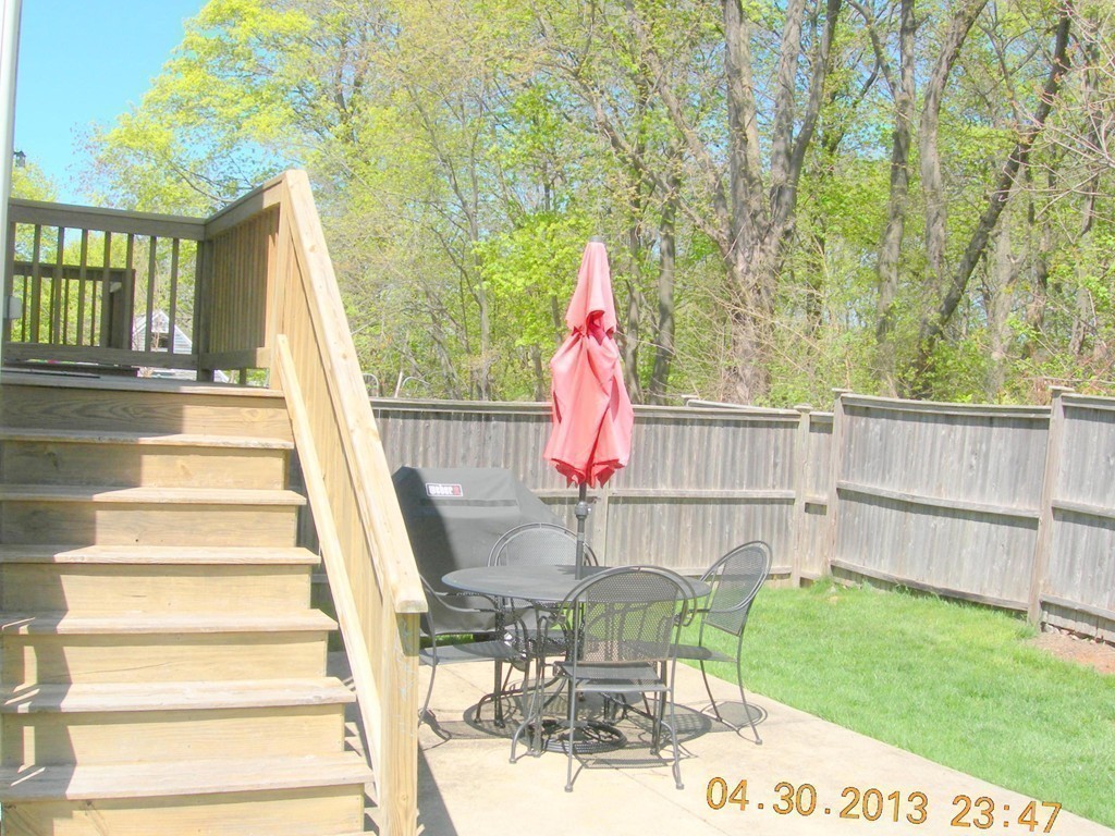 343 Quarry Street, Unit 2 Quincy, MA 02169 - Photo 30 of 30 a view of backyard with table and chairs