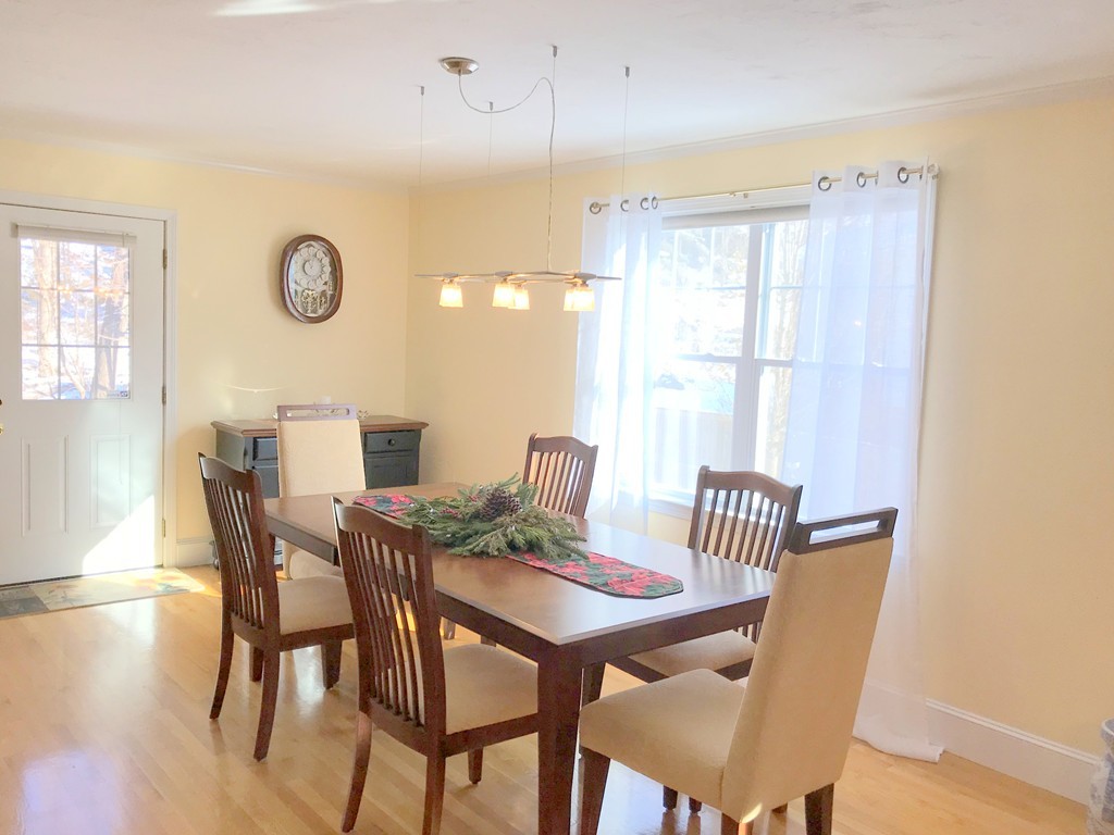 343 Quarry Street, Unit 2 Quincy, MA 02169 - Photo 6 of 30 a view of a dining room with furniture and a window