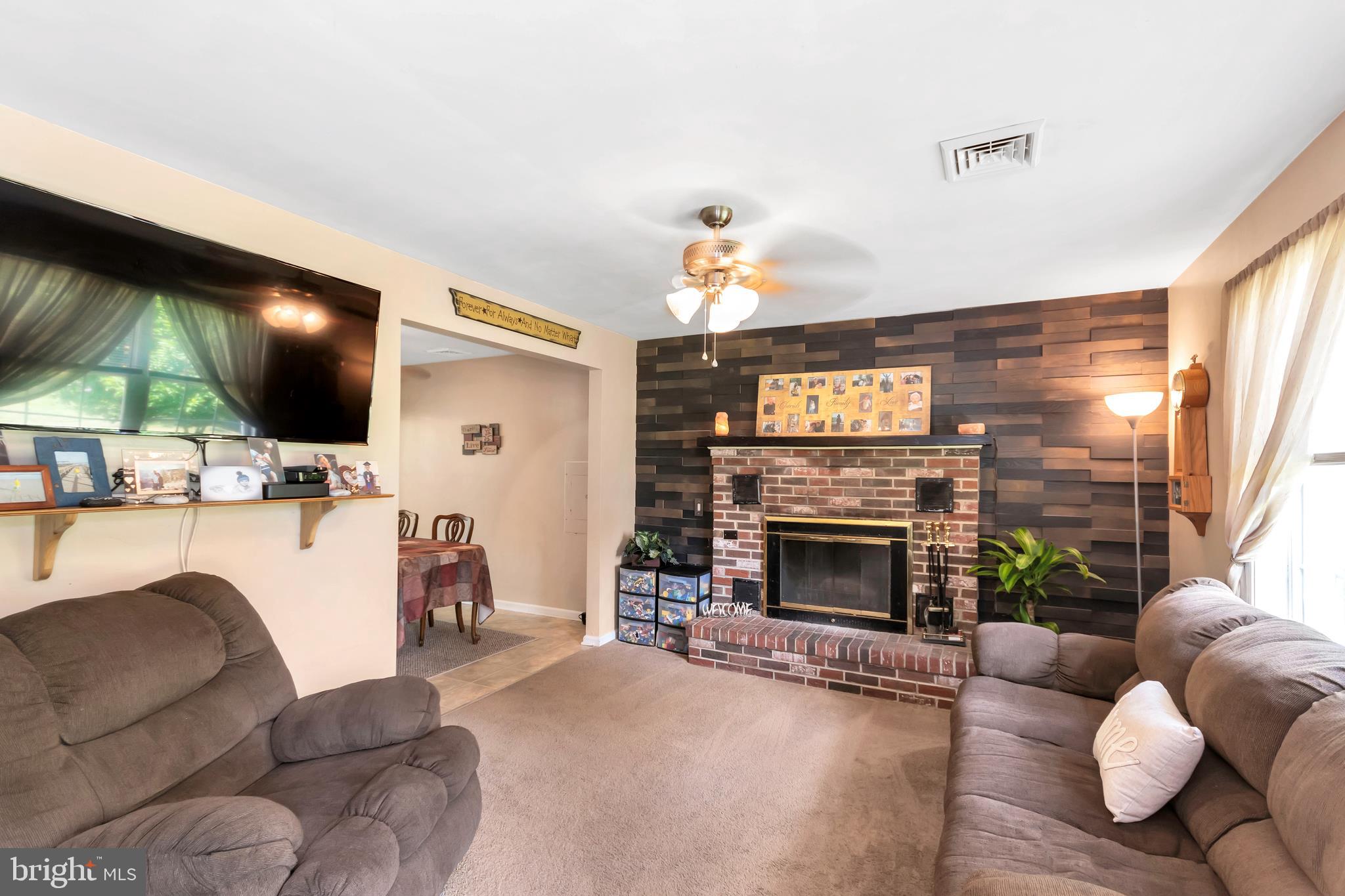 377 Broadlane Road Williamstown, NJ 08094 - Photo 3 of 27 Living Room - Wood burning fire place