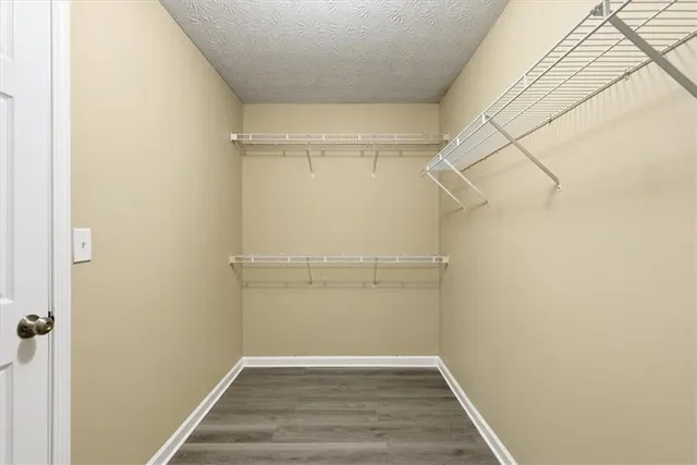 a view of an empty walk in closet