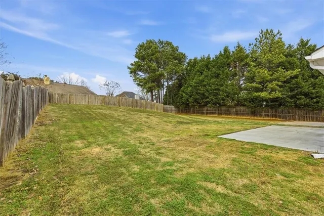 a view of a swimming pool with an ocean view