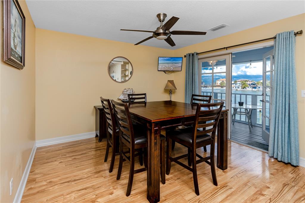 2601 Bay Boulevard Indian Rocks Beach, FL 33785 - Photo 14 of 64 a dining room with furniture and window