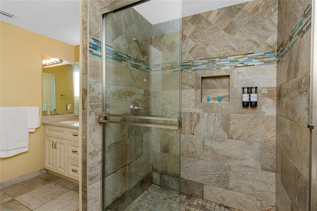 2601 Bay Boulevard Indian Rocks Beach, FL 33785 - Photo 27 of 64 a bathroom with a shower