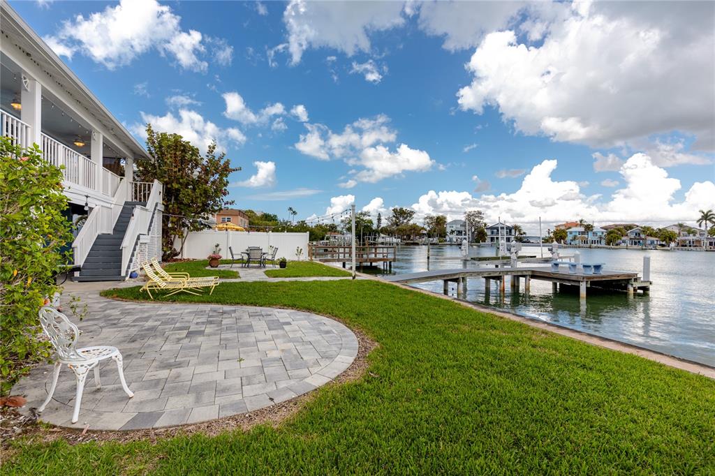 2601 Bay Boulevard Indian Rocks Beach, FL 33785 - Photo 36 of 64 a view of a lake with a house in the background