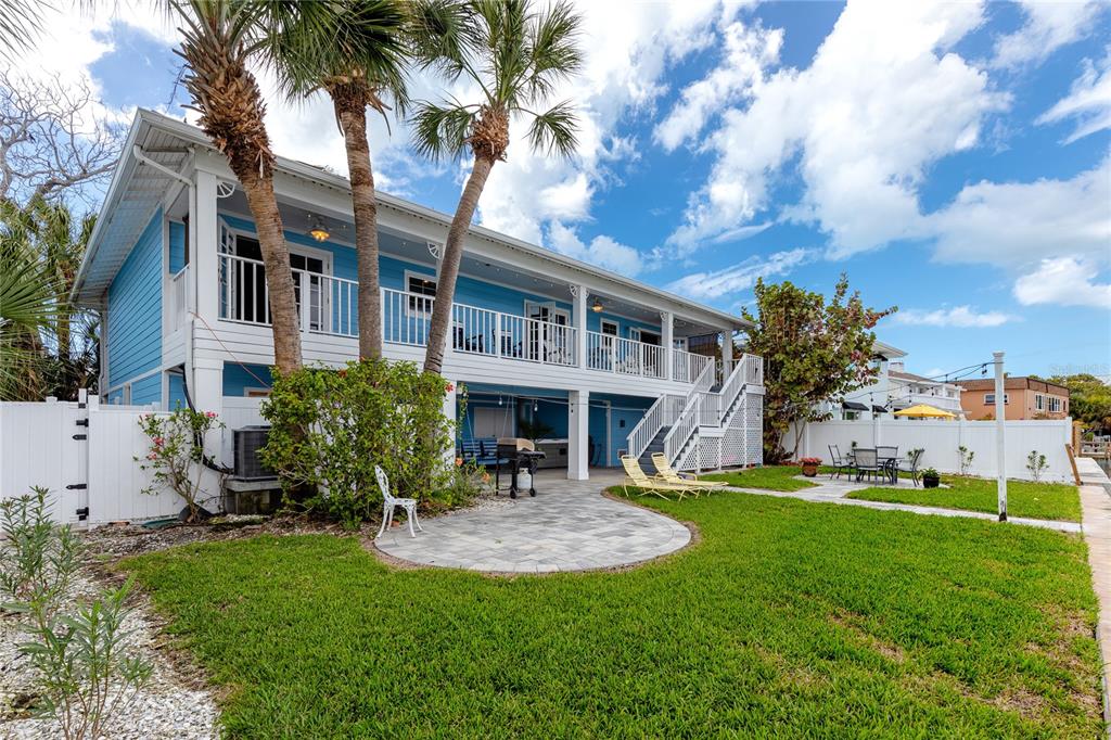 2601 Bay Boulevard Indian Rocks Beach, FL 33785 - Photo 37 of 64 a view of a house with a yard porch and sitting area