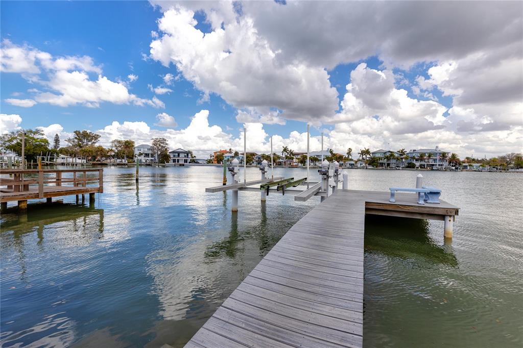 2601 Bay Boulevard Indian Rocks Beach, FL 33785 - Photo 38 of 64 a lake view with boat and trees in the background