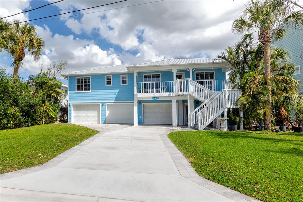 2601 Bay Boulevard Indian Rocks Beach, FL 33785 - Photo 40 of 64 a front view of house with yard and green space