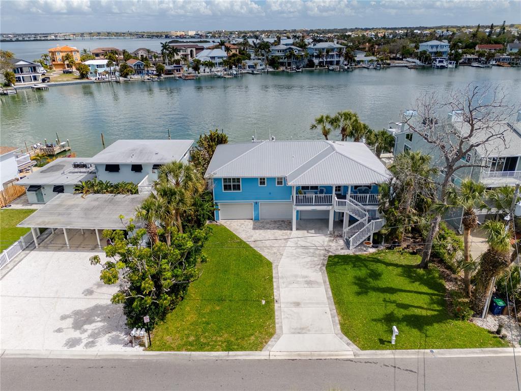 2601 Bay Boulevard Indian Rocks Beach, FL 33785 - Photo 48 of 64 an aerial view of a house with outdoor seating and lake view