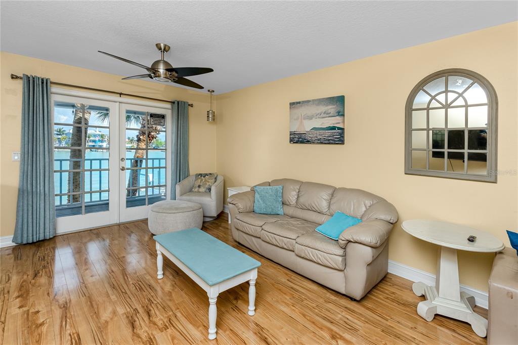 2601 Bay Boulevard Indian Rocks Beach, FL 33785 - Photo 10 of 64 a living room with furniture and a large window