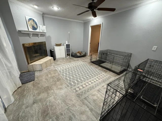 a bedroom with a bed and a fireplace