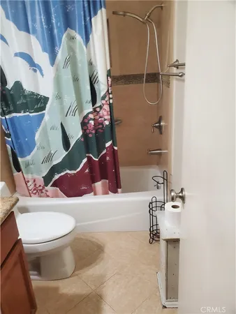 a bathroom with a sink and toilet