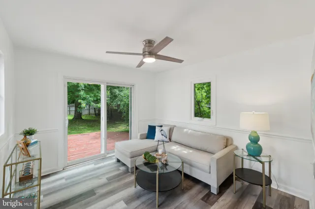 a living room with furniture and window