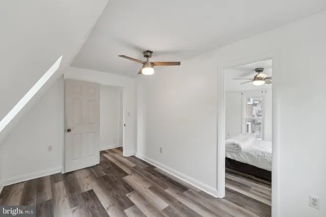 a view of livingroom with hardwood floor and ceiling fan