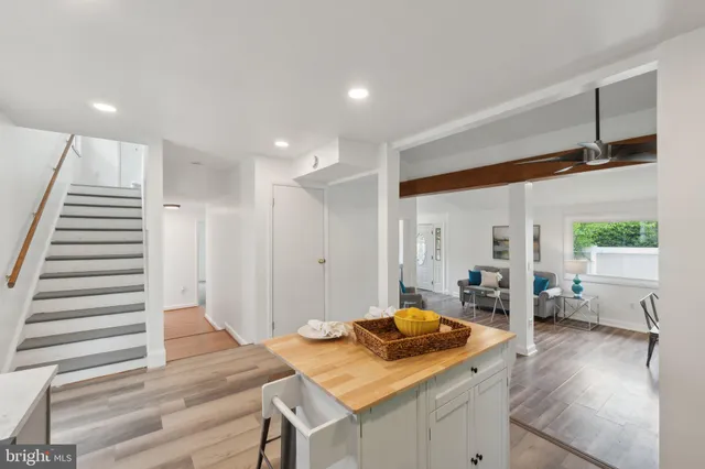 a open kitchen with a table and chairs in it