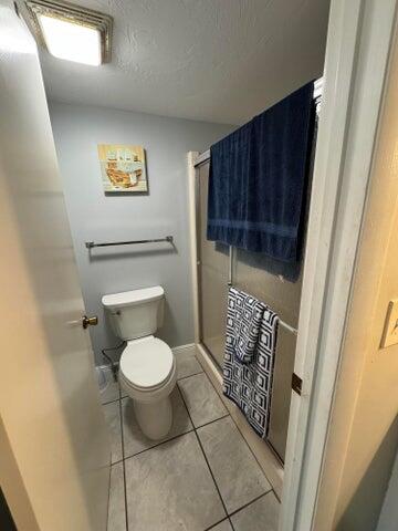 3290 Southeast Aster Lane, Unit D259 Stuart, FL 34994 - Photo 15 of 16 a bathroom with a toilet and a shower