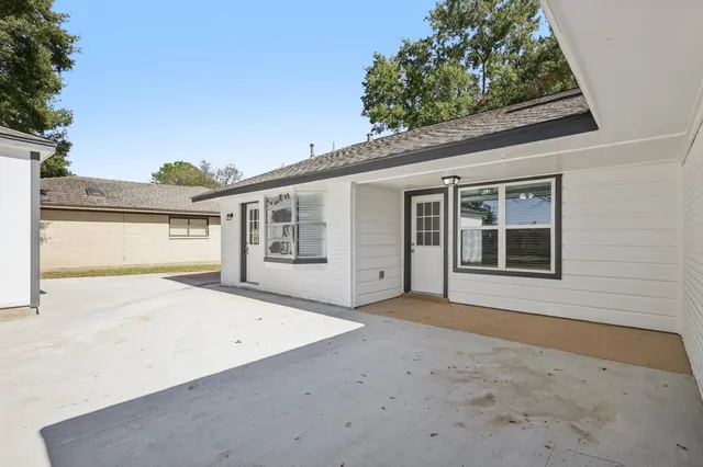 a front view of a house with a garage