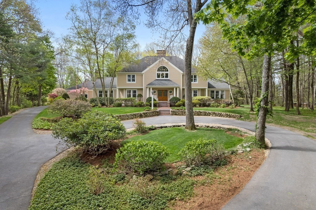 54 Bedford Road Lincoln, MA 01773 - Photo 25 of 34 a front view of a house with a yard