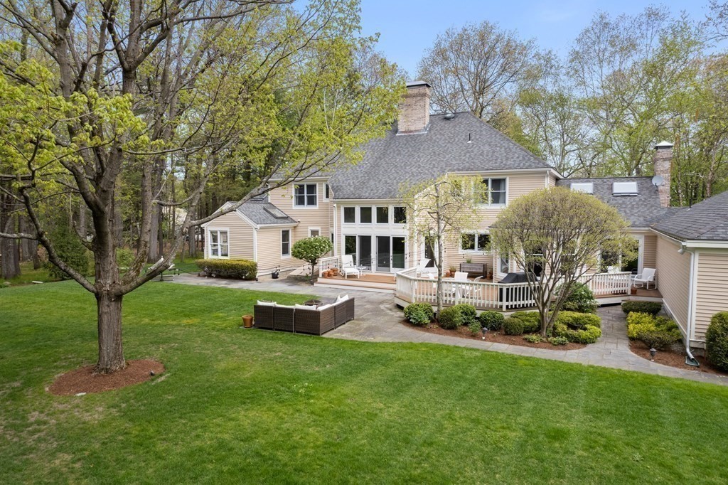 54 Bedford Road Lincoln, MA 01773 - Photo 32 of 34 a view of house with a garden