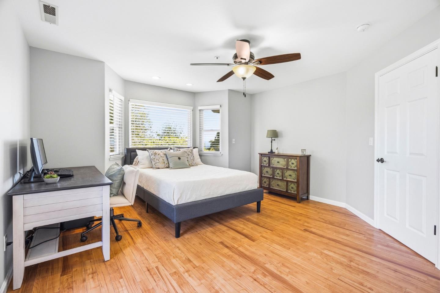 2500 Nelson Road Scotts Valley, CA 95066 - Photo 36 of 77 a bedroom with a bed and a chandelier
