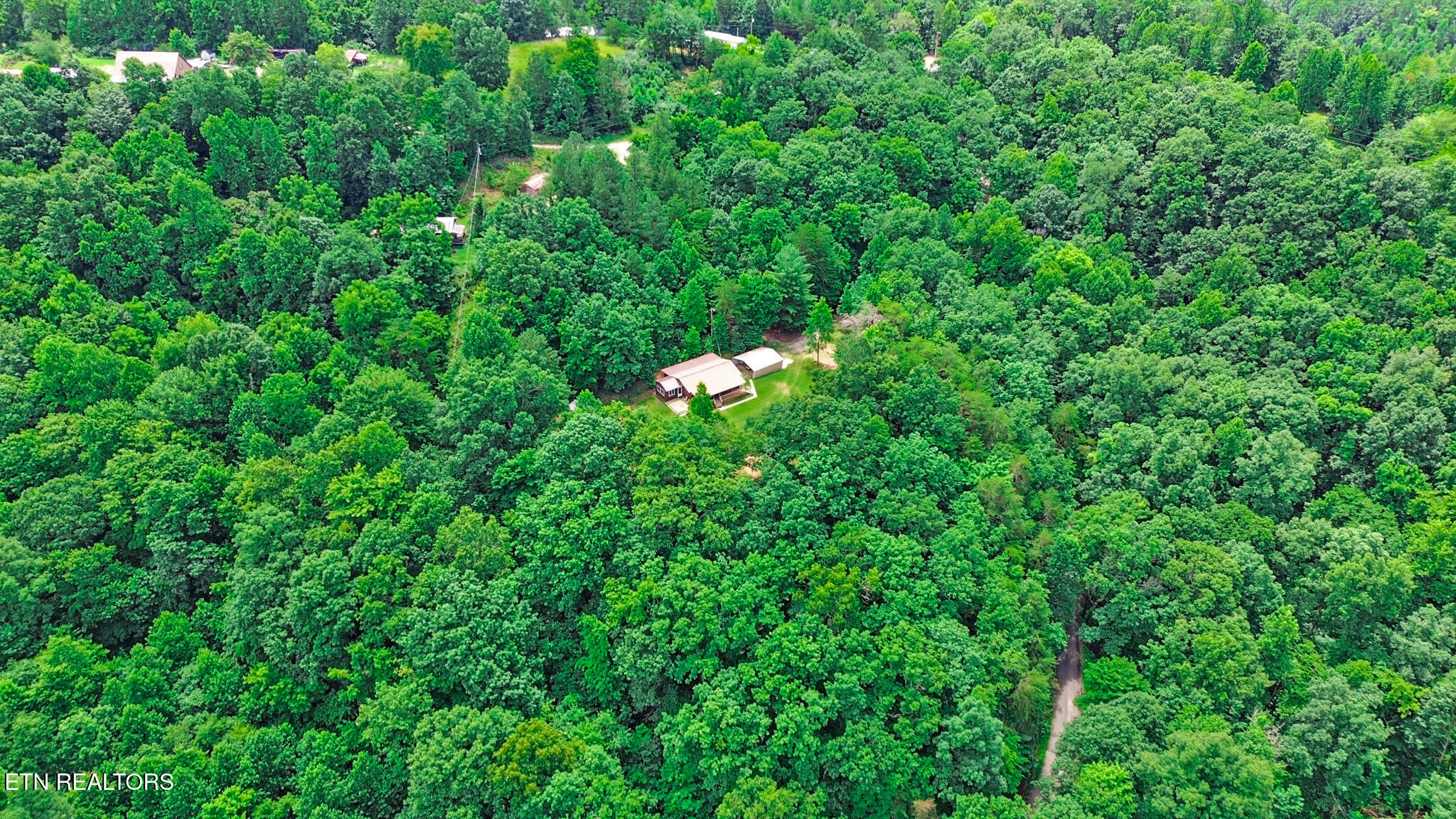 615 East Robbins Road Robbins, TN 37852 - Photo 10 of 44 dji_0231-dji_0233