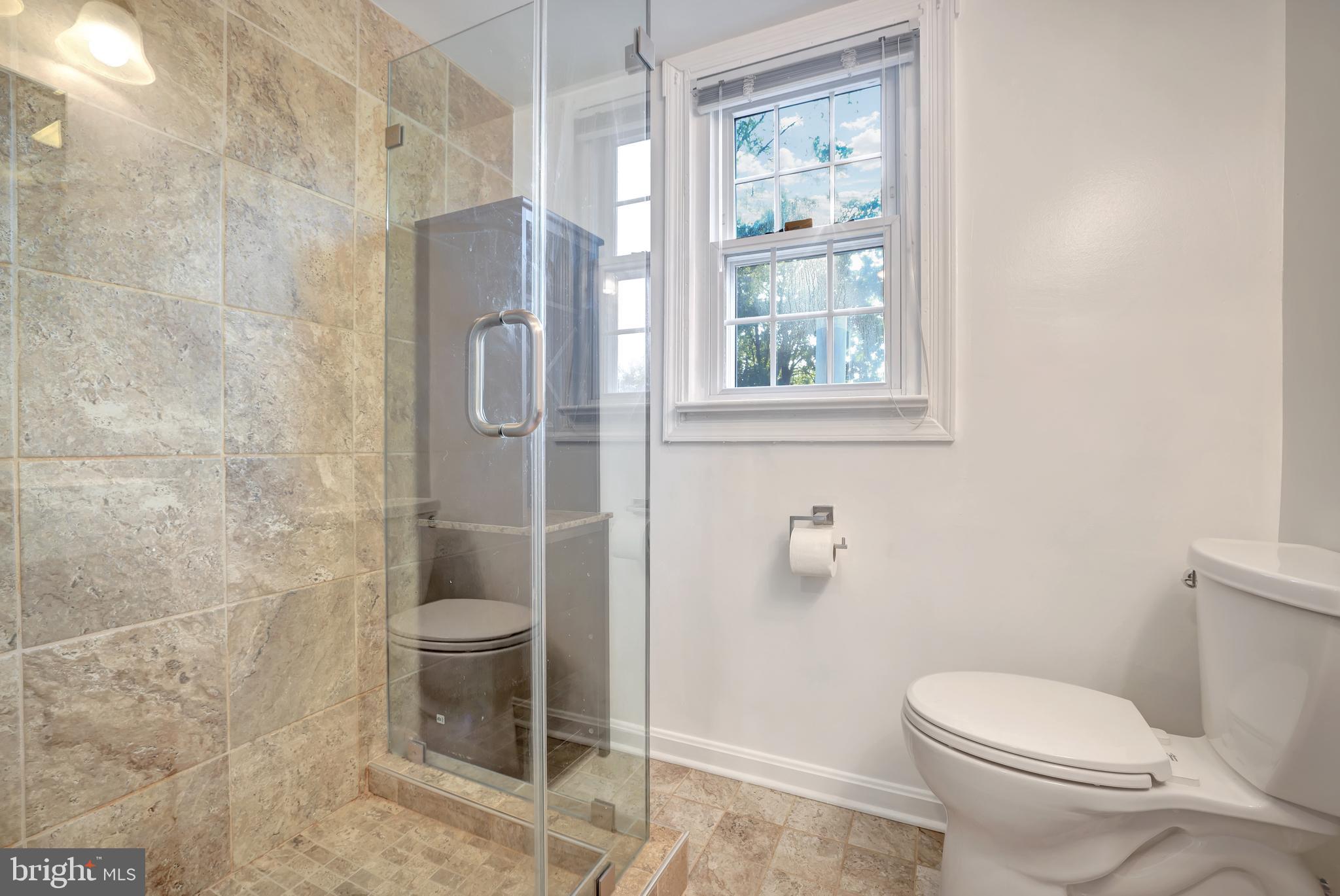 10700 Hayes Avenue Silver Spring, MD 20902 - Photo 19 of 38 2nd Floor Bath with shower.