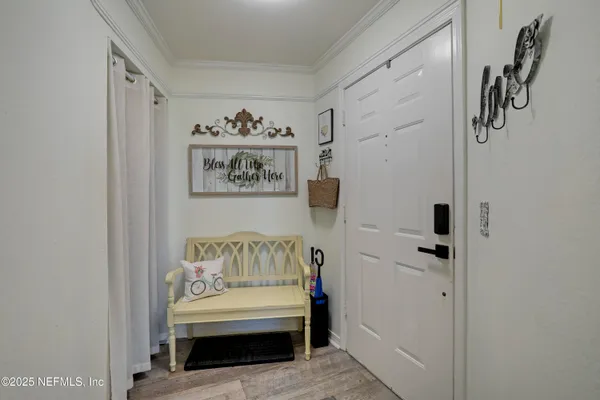 a kitchen with stainless steel appliances granite countertop a refrigerator a stove and a sink