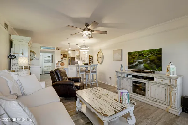 a bathroom with a double vanity sink mirror and shower