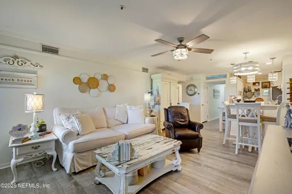 a bathroom with a window and a shower
