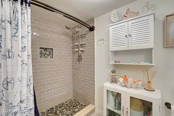a view of a storage & utility room with washer and dryer