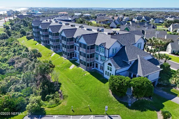 a front view of a house with a swimming pool