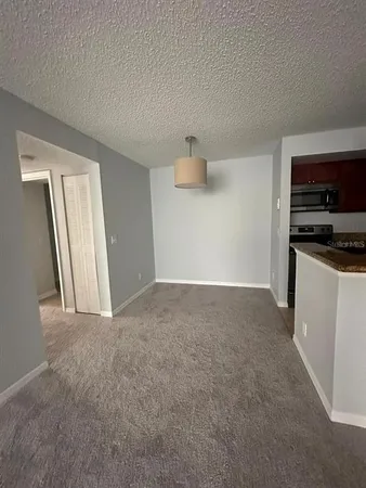 a view of empty room with front door