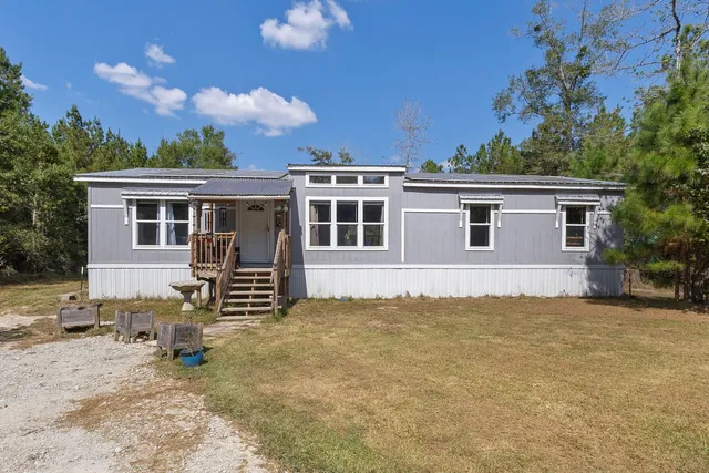 a view of a house with a patio