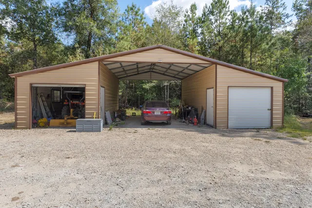 a view of a car parked in front of house