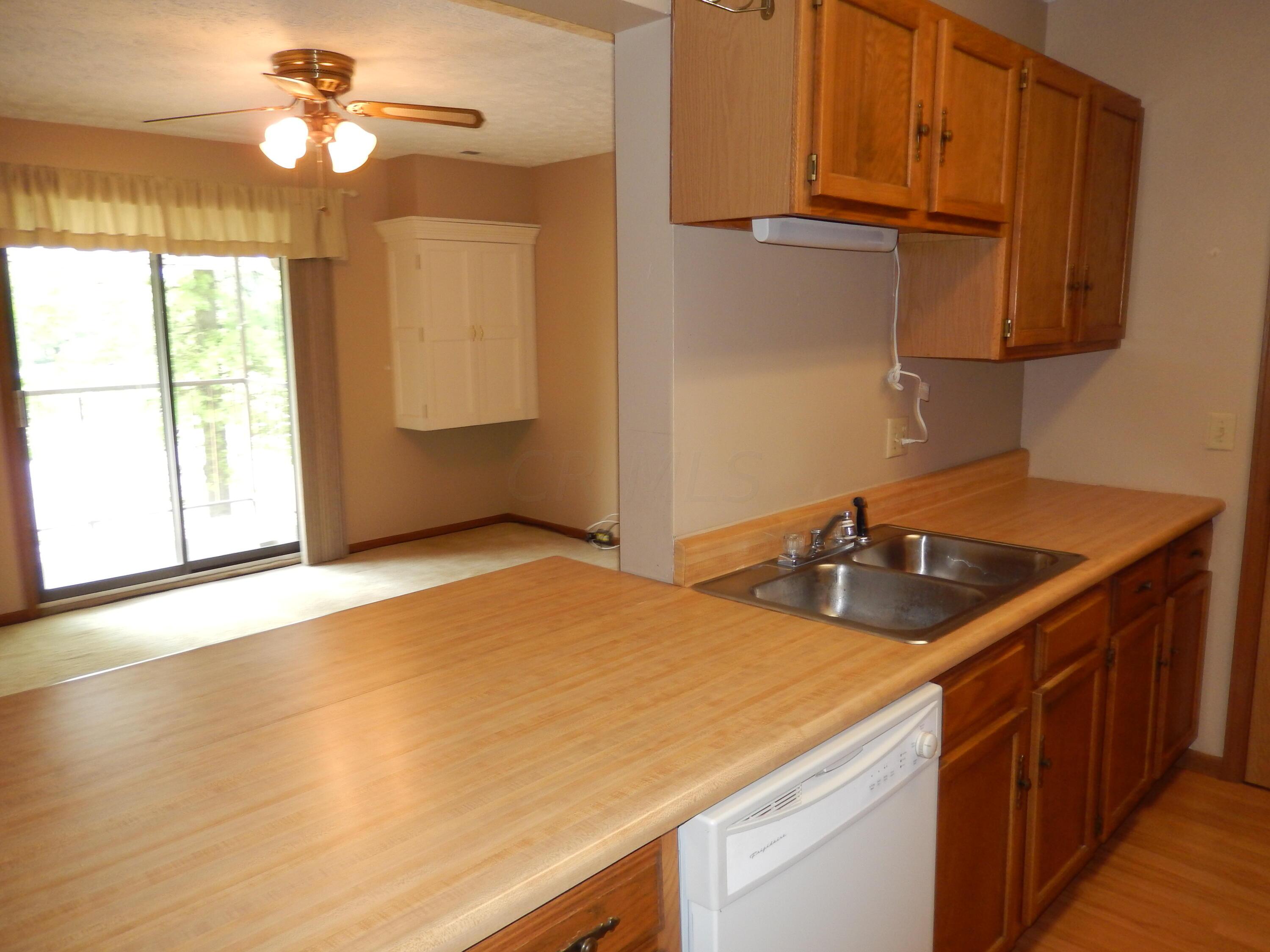 4119 Karl Road, Unit 309 Columbus, OH 43224 - Photo 19 of 26 Kitchen with Breakfast Bar Area