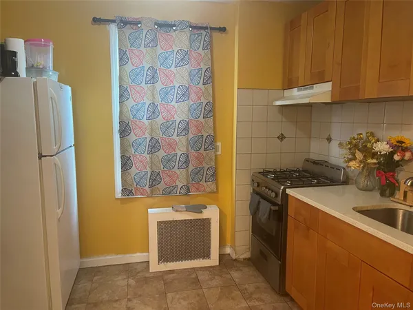 a room with furniture and a wooden floor