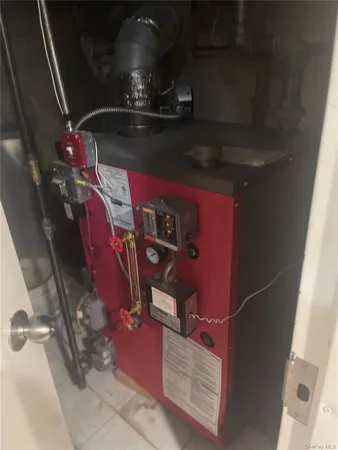 a kitchen with granite countertop a stove and a sink