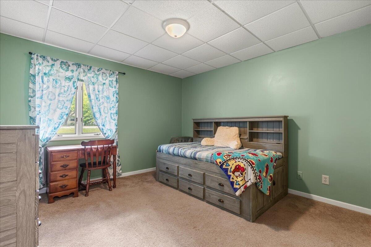 2522 Cindy Street Athens, TN 37303 - Photo 21 of 36 a bedroom with a bed and a window