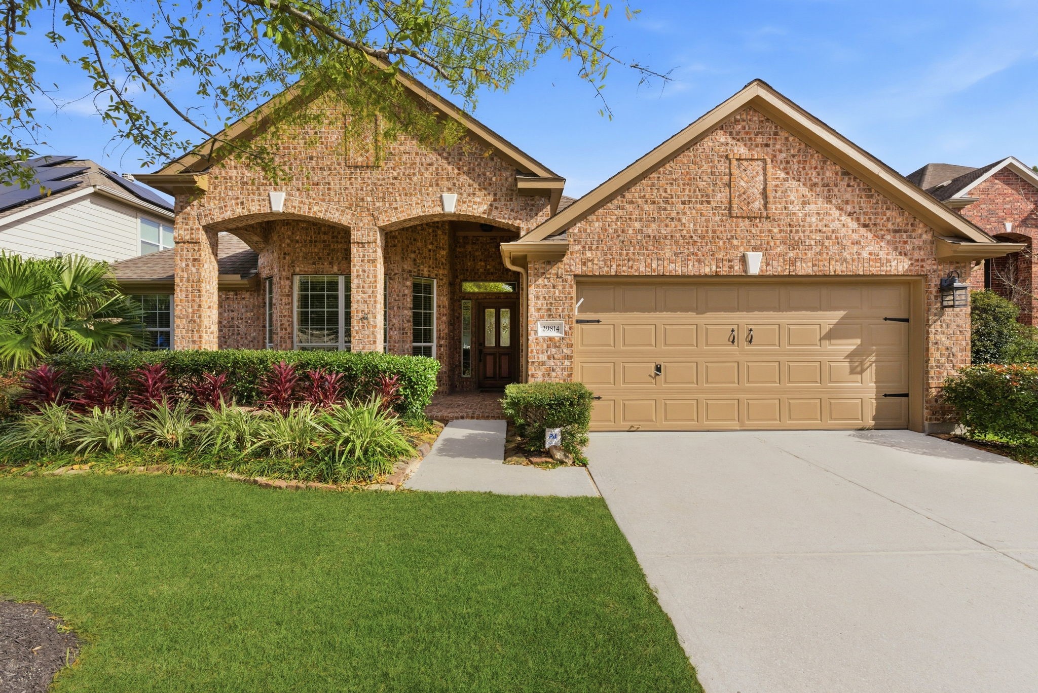 29814 Legends Pass Lane Spring, TX 77386 - Photo 1 of 46 front view of a house with a yard