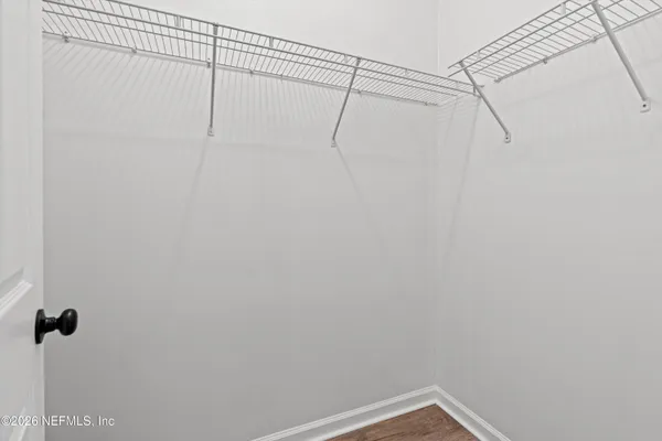 a view of a room with racks on the wall