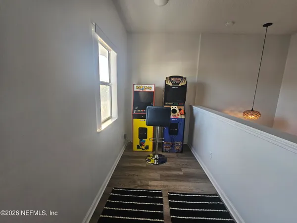 a view of a hallway with workspace
