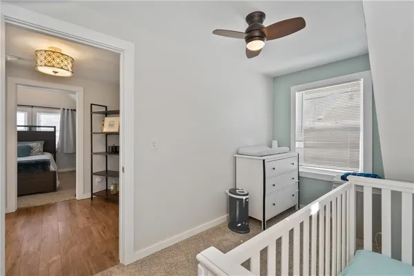 a view of a hallway with windows