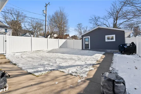 a view of a backyard of the house