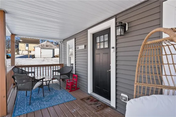 a view of a balcony with dining area