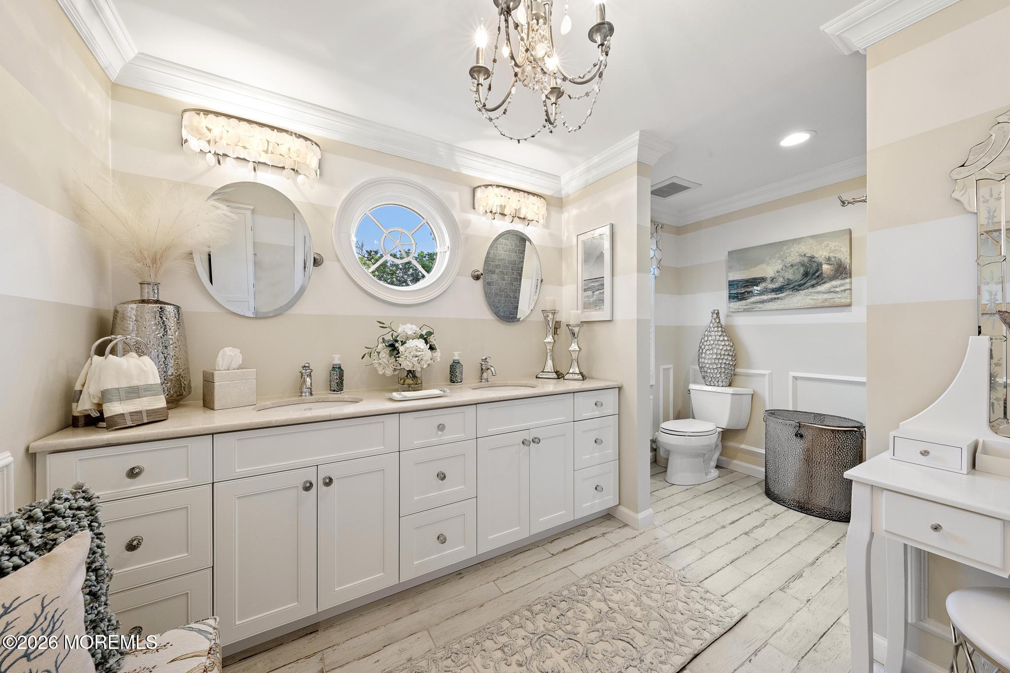 57 Beaver Dam Road Colts Neck, NJ 07722 - Photo 13 of 79 a spacious bathroom with a double vanity sink and a mirror