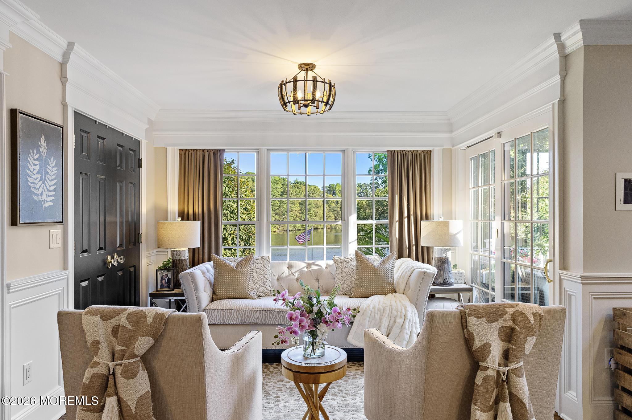57 Beaver Dam Road Colts Neck, NJ 07722 - Photo 31 of 79 a living room with furniture and a large window