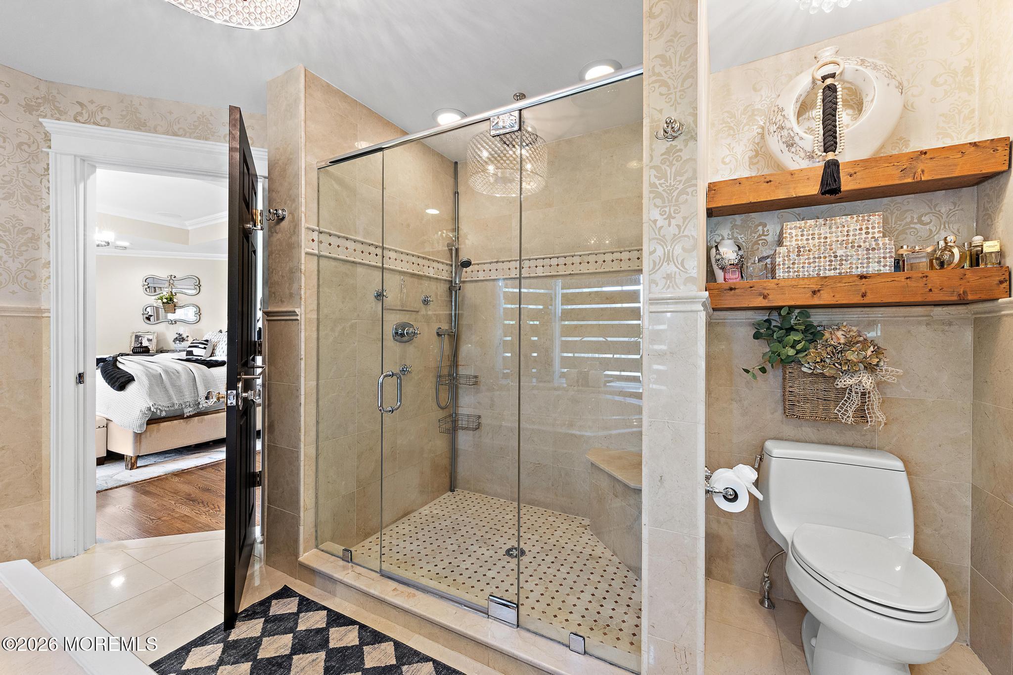 57 Beaver Dam Road Colts Neck, NJ 07722 - Photo 35 of 79 a bathroom with a shower a mirror and a shower