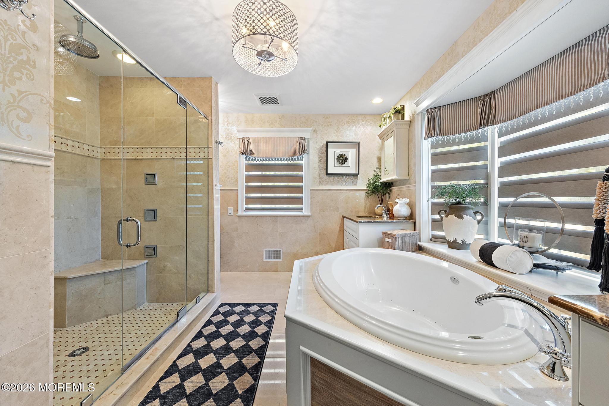 57 Beaver Dam Road Colts Neck, NJ 07722 - Photo 36 of 79 a bathroom with a granite countertop sink a large mirror and shower