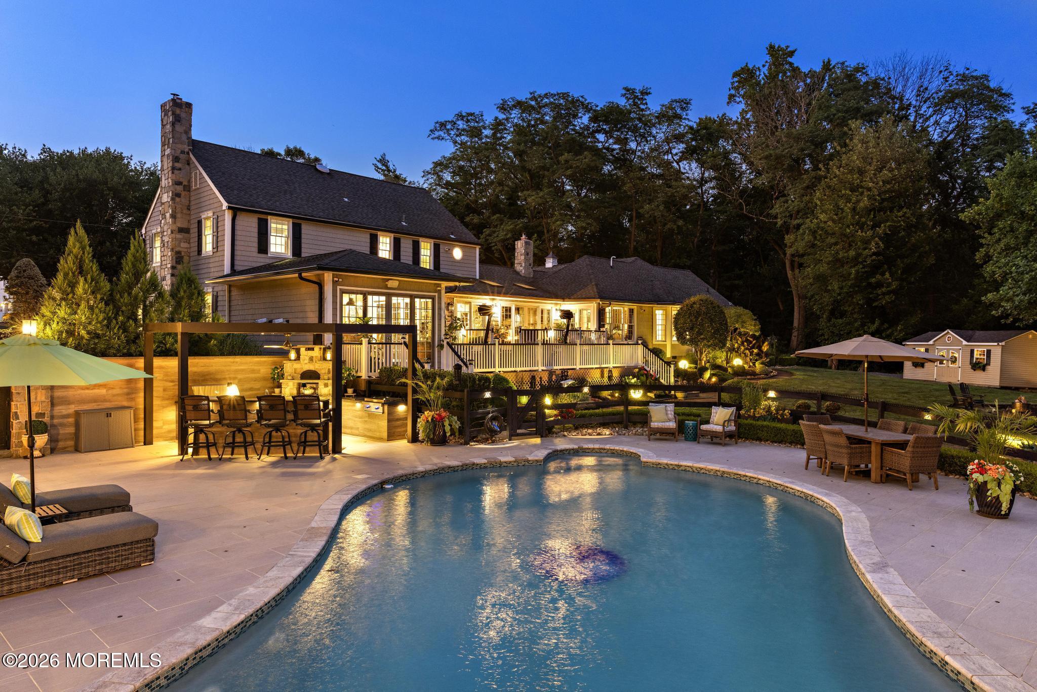 57 Beaver Dam Road Colts Neck, NJ 07722 - Photo 65 of 79 a view of a swimming pool with a patio